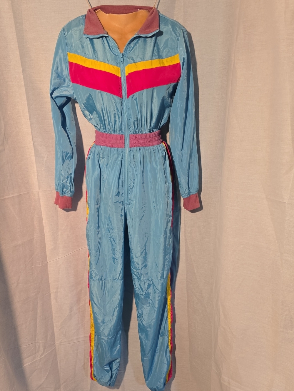 Spirit Halloween 80s Retro Windbreaker Jumpsuit Neon Blue Pink XS/S